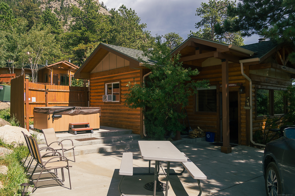 View of the hot tub, outdoor area, and cabin