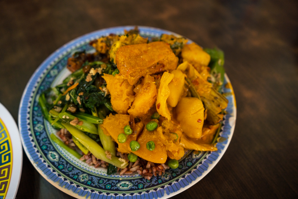 Braised tofu and potatoes, among other goodies on top of some wild rice.