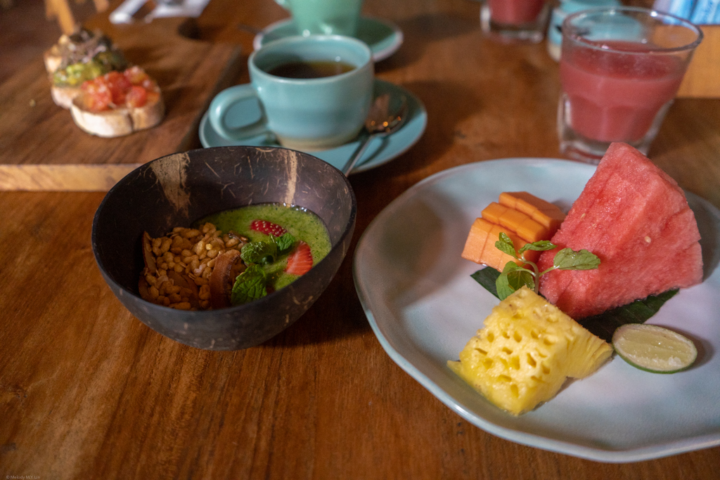 Smoothie bowl, fruit plate, and drinks