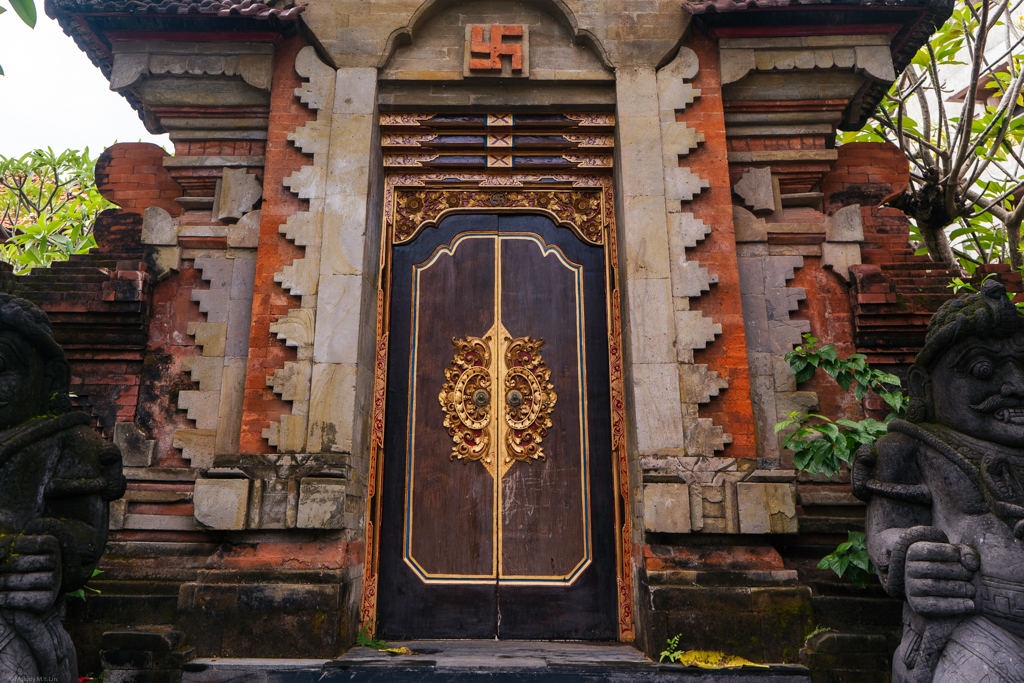 Temple doors and stone guardians