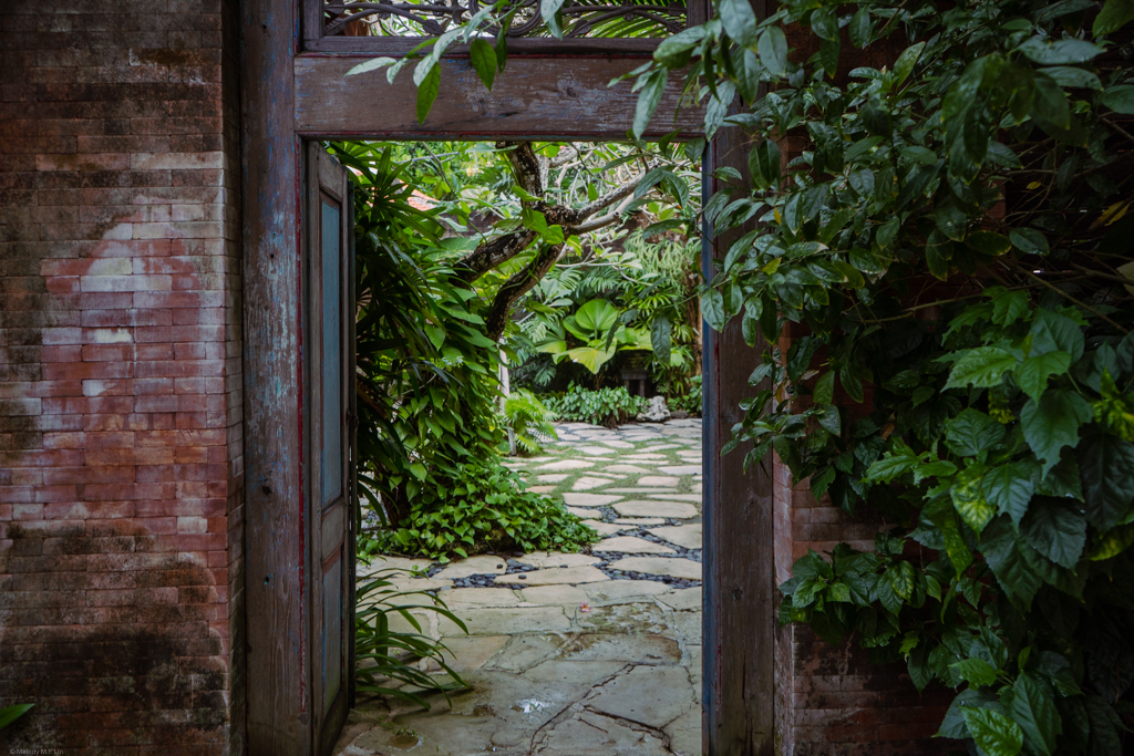 Doorway opening to the hotel gardens