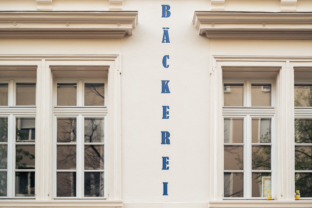 The words "Bäckerei" painting on the face of the building