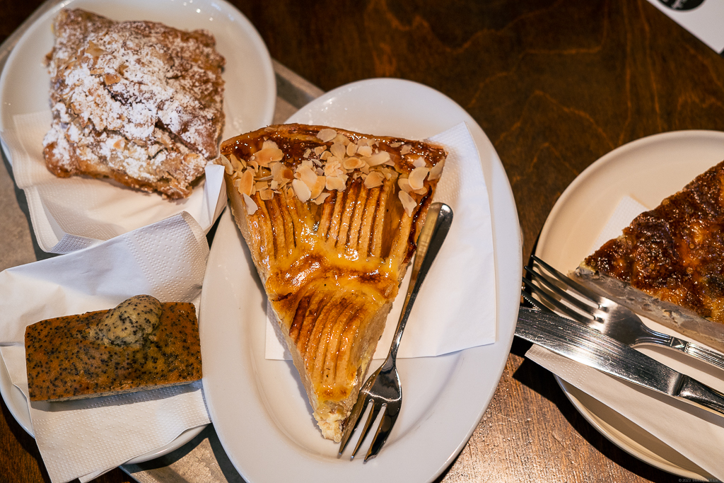 Apfelkuchen, banana poppy seed bread, an almond croissant, and the daily quiche