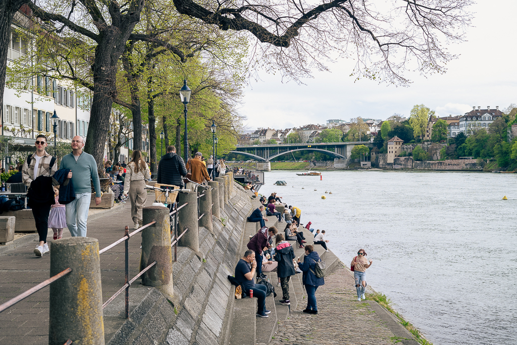 Tourists and locals alike relaxing on the river banks