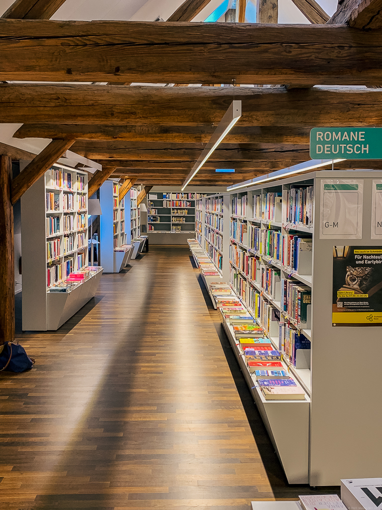 Exposed beams on the top floor of the library