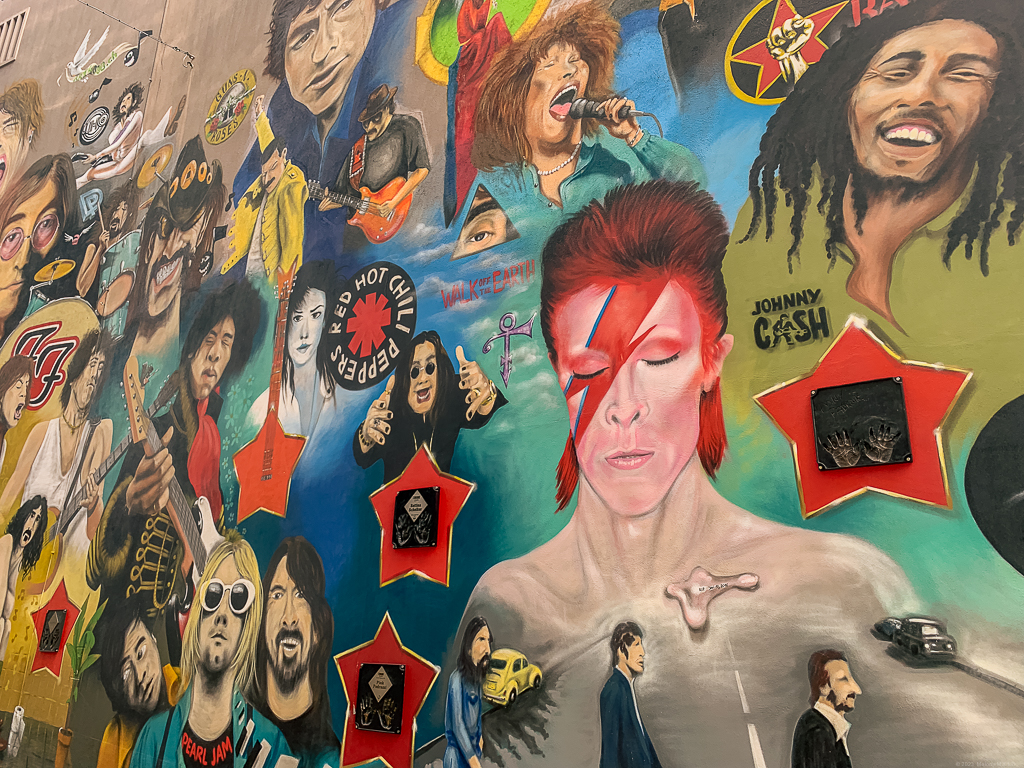 Mural of various rock stars like the Beatles and David Bowie