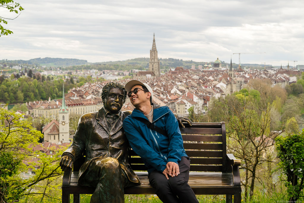 D laughing gaily with Einstein's statue