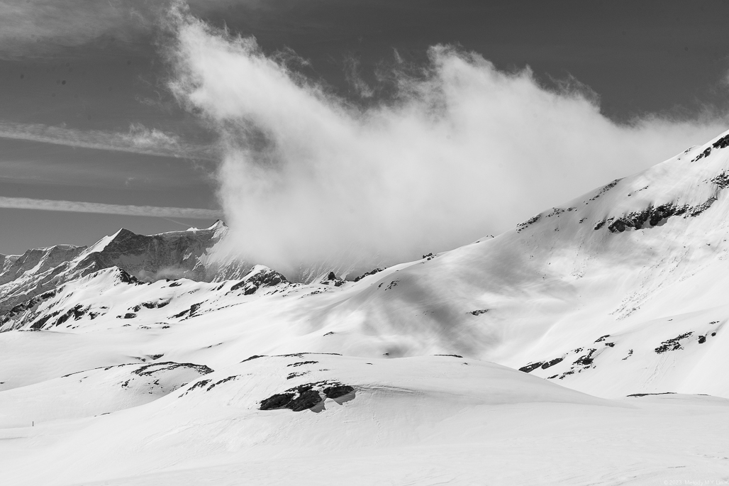 Clouds rising over the ridge