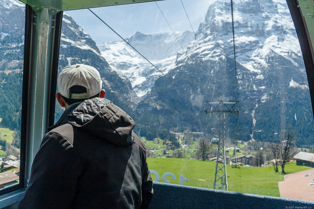 D looking out the gondola windows