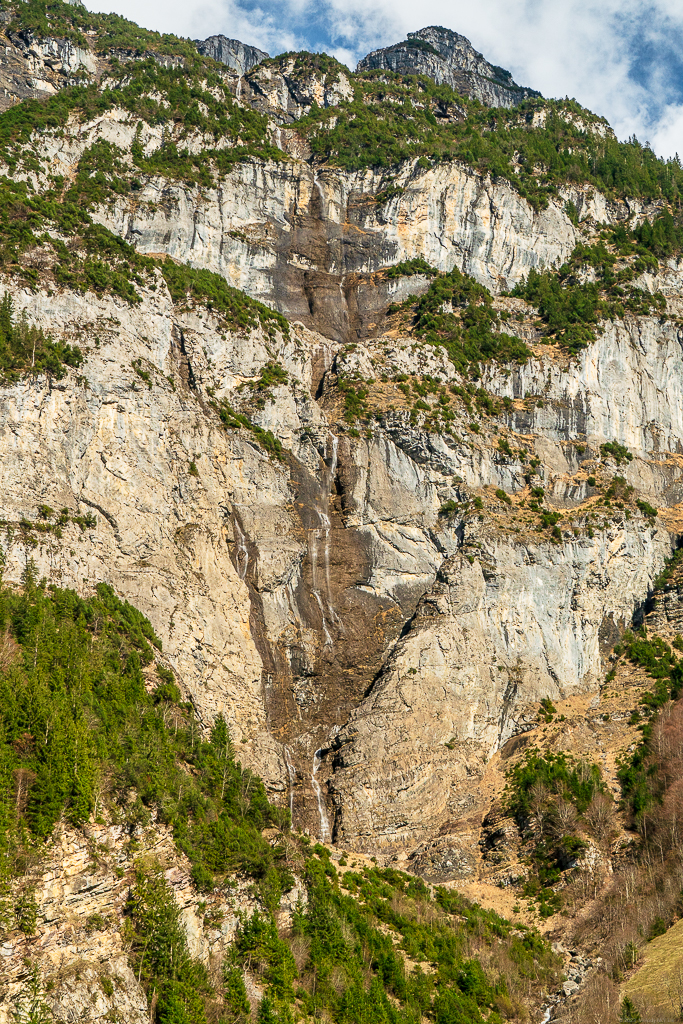 Waterfall with multiple drops from the top of the mountain to the bottom