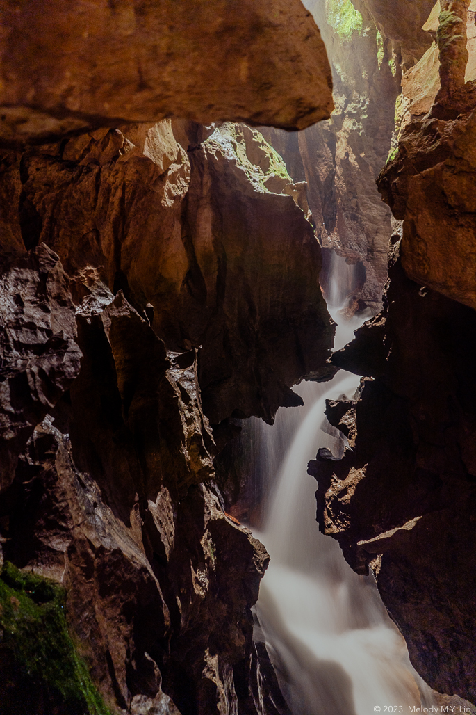 The waterfall and the gorge cut into the caverns