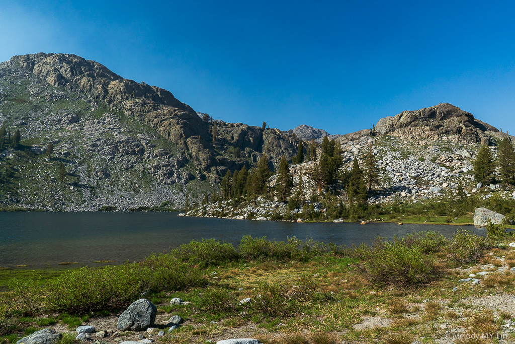 Rocky outcrops at the outlet of the lake