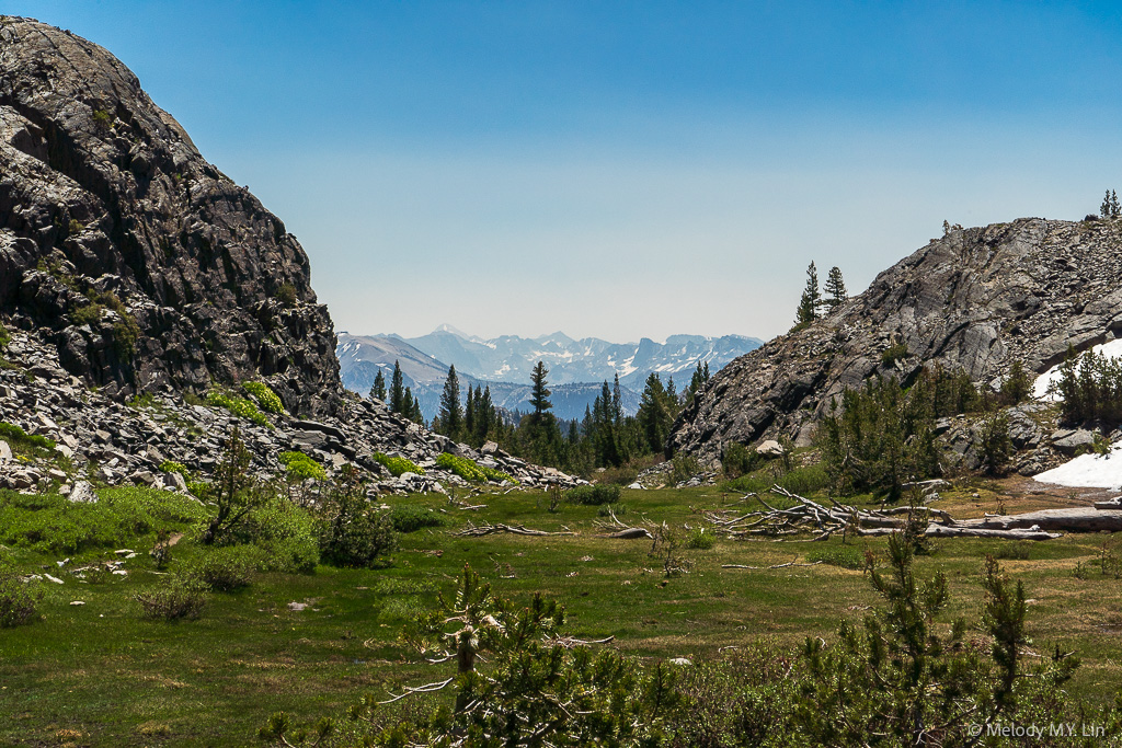 A close up of the mountains on the horizon